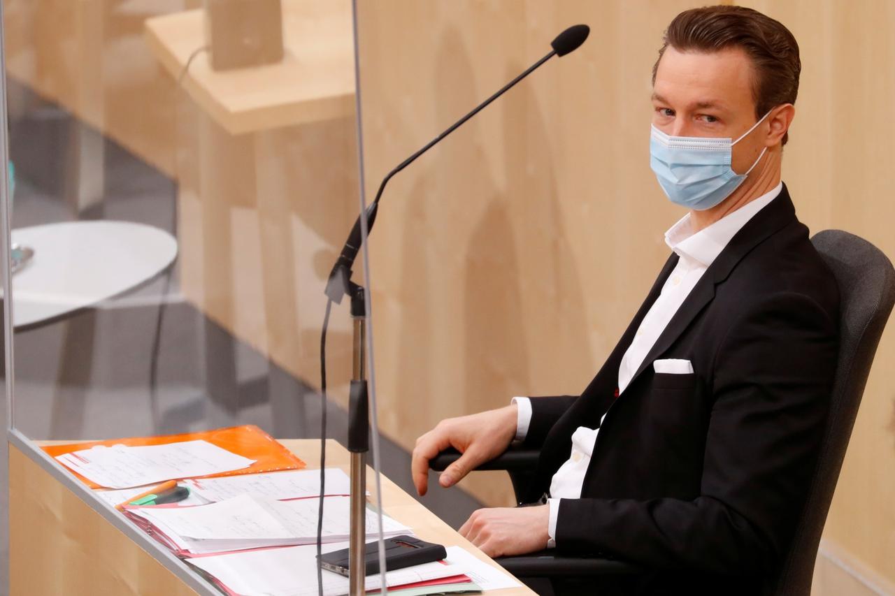 Austrian Finance Minister Bluemel waits for the start of a session of the Parliament in Vienna