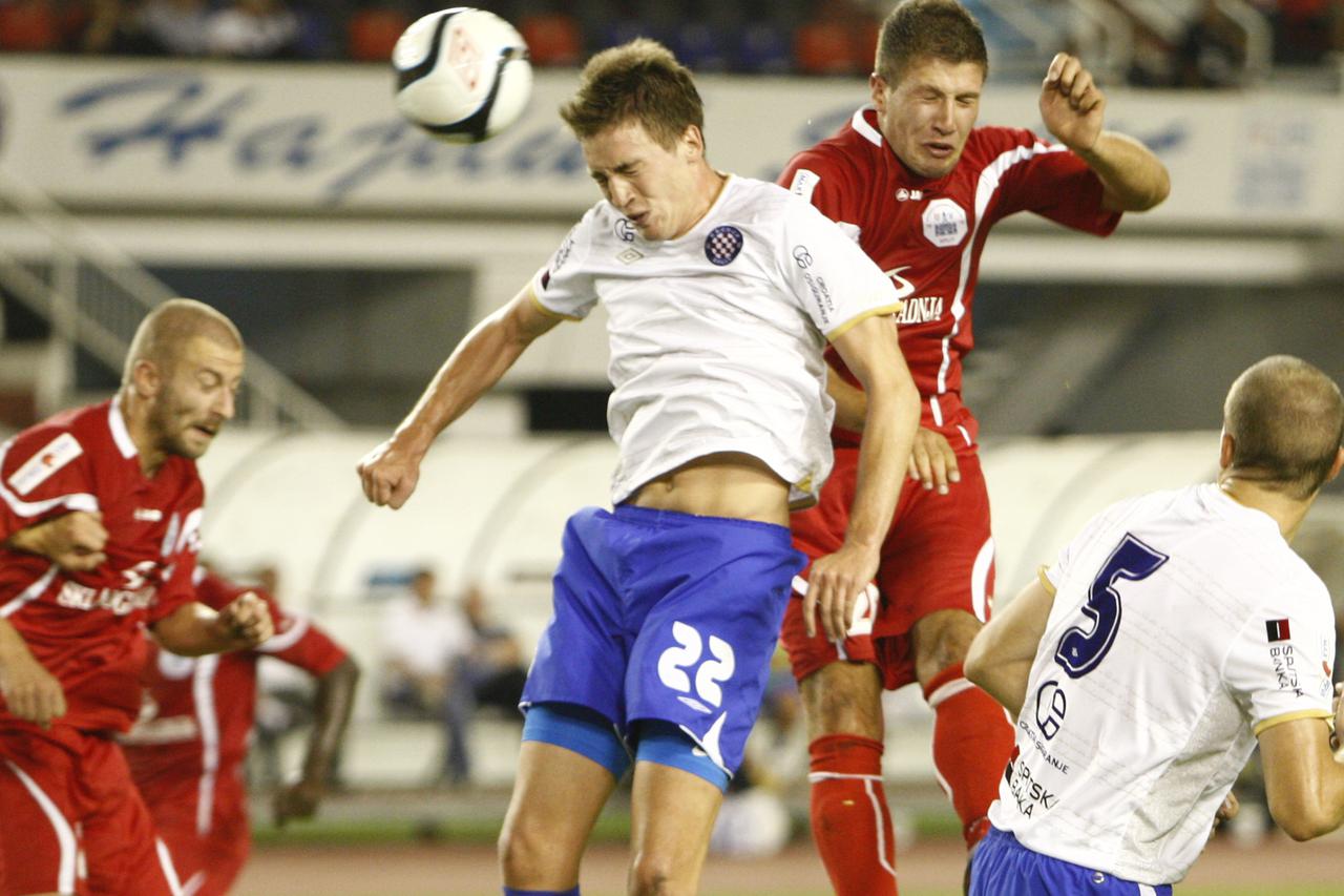 29.07.2012., Stadion Poljud, Split  - MAXtv 1. HNL, 2. kolo, HNK Hajduk - RNK Split. Mario Maloca i Tomislav Radotic u skoku za loptu. Photo: Ivo Cagalj/PIXSELL