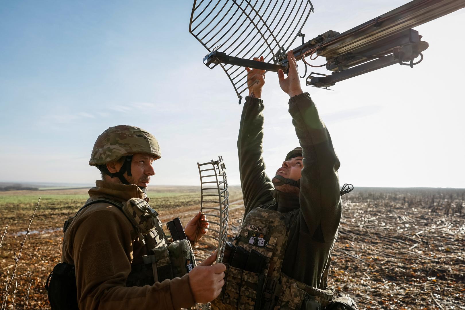 Servicemen of the 15th Separate Artillery Reconnaissance Brigade of the Armed Forces of Ukraine install an equipment before launching a Shark drone, amid Russia's attack on Ukraine, in Kharkiv region, Ukraine, October 30, 2023. REUTERS/Alina Smutko Photo: ALINA SMUTKO/REUTERS
