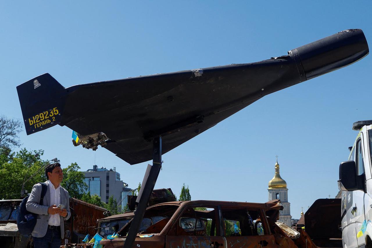 Resident looks at a Russian-Iranian Shahed-136 (Geran-2) kamikaze drone installed in Kyiv