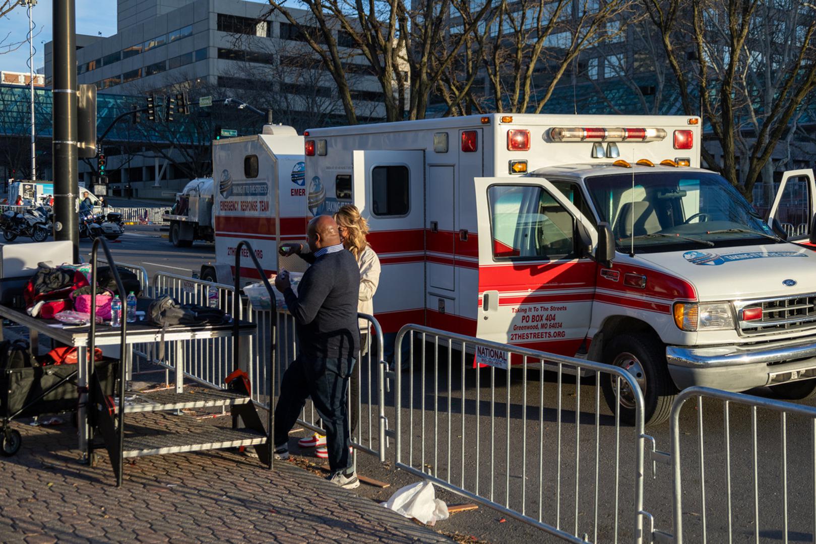 (240215) -- KANSAS CITY, Feb. 15, 2024 (Xinhua) -- This photo taken on Feb. 14, 2024 shows an ambulance waiting at the site following a shooting in Kansas City, Missouri, the United States. At least one person was killed and 22 were injured as gunfire erupted during the Kansas City Chiefs' Super Bowl victory parade in Kansas City, U.S. state of Missouri, Stacey Graves, chief of the Kansas City Missouri Police Department, said at a news conference on Wednesday afternoon. (Photo by Robert Reed/Xinhua) Photo: Robert Reed/XINHUA