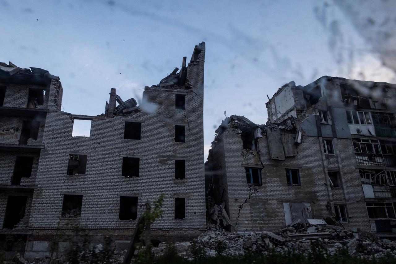 A view shows heavily damaged residential buildings in the town of Chasiv Yar