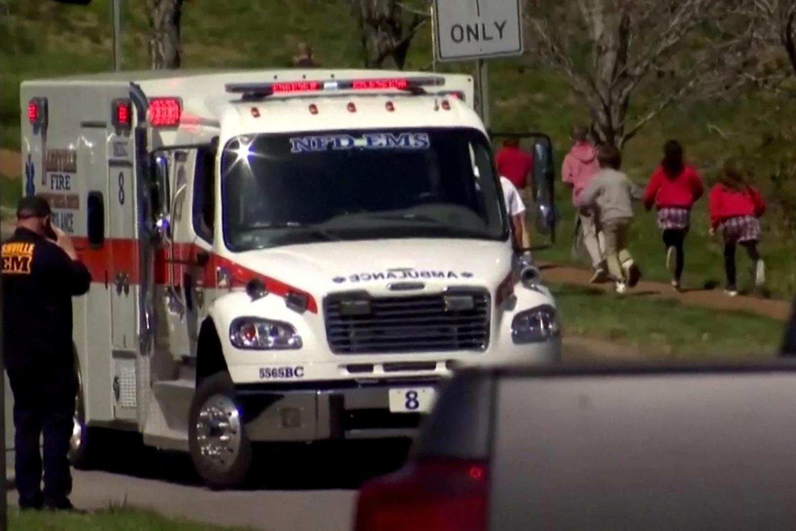 Children run past an ambulance near the Covenant School after a shooting in Nashville, Tennessee, U.S. March 27, 2023 in a still image from video.  WKRN/NewsNation via REUTERS.  NO RESALES. NO ARCHIVES MANDATORY CREDIT Photo: WKRN/NEWSNATION/REUTERS