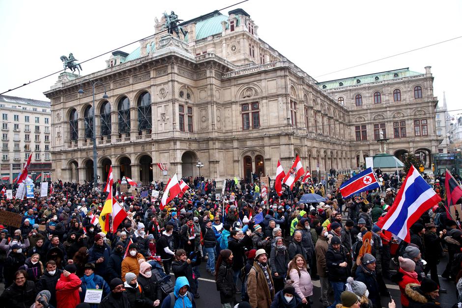 People protest against coronavirus restrictions and the vaccine mandate in Vienna