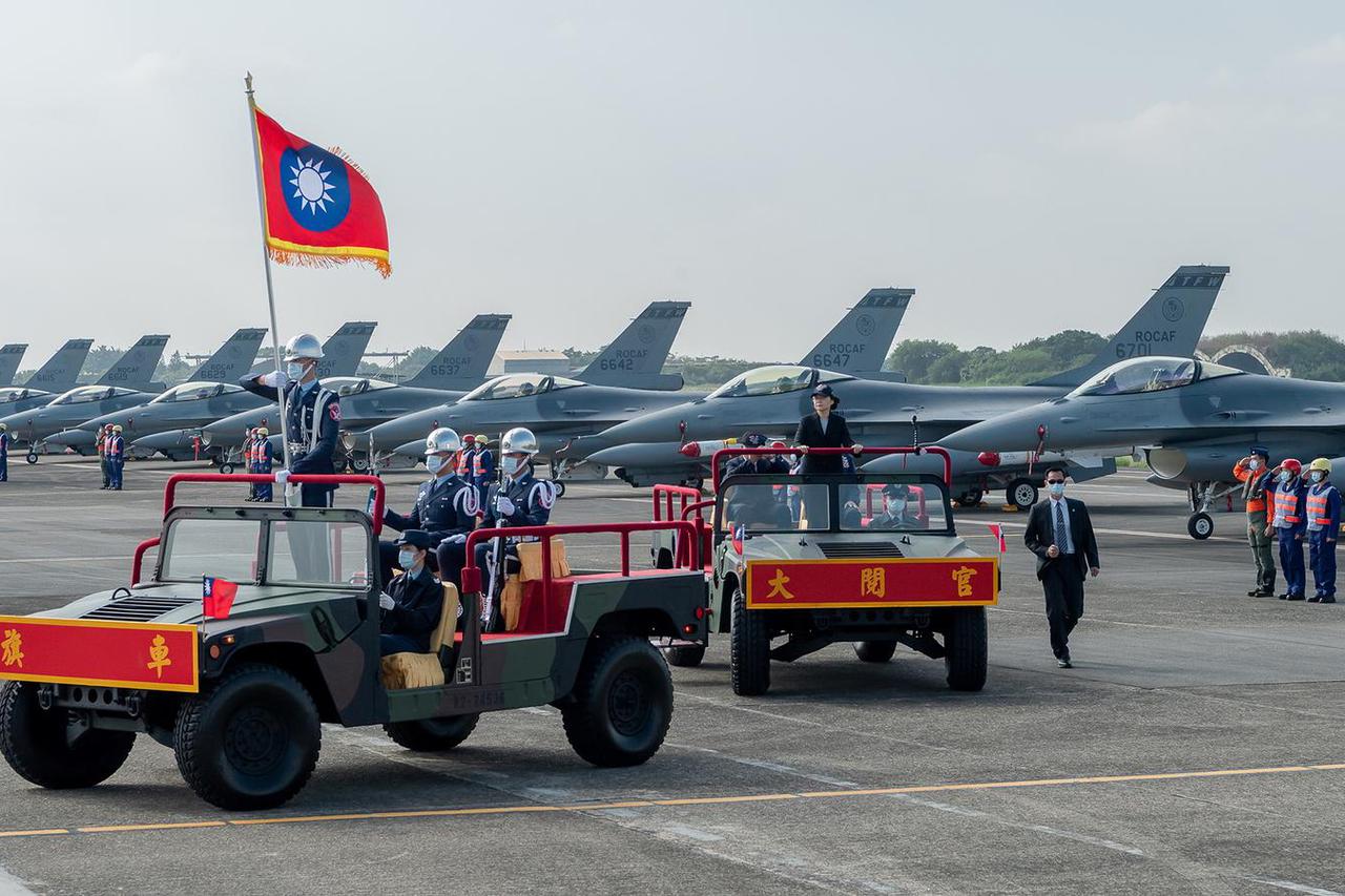 Handout picture of Taiwan President Tsai Ing-wen oversees the commission of the first squadron of the upgraded F-16V fighters in Chiayi Air Force Base, Taiwan