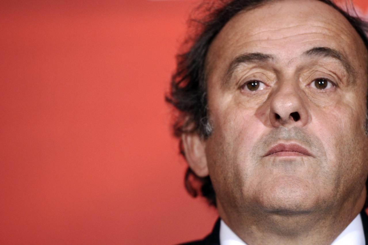'UEFA president Michel Platini attends a press conference on the Euro 2016 football tournament on October 23, 2012 at the FFF headquarters in Paris. AFP PHOTO LIONEL BONAVENTURE '