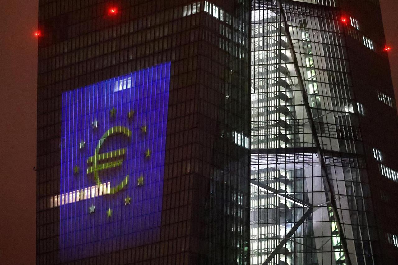 FILE PHOTO: Sun sets over the skyline and ECB headquarters in Frankfurt, Germany