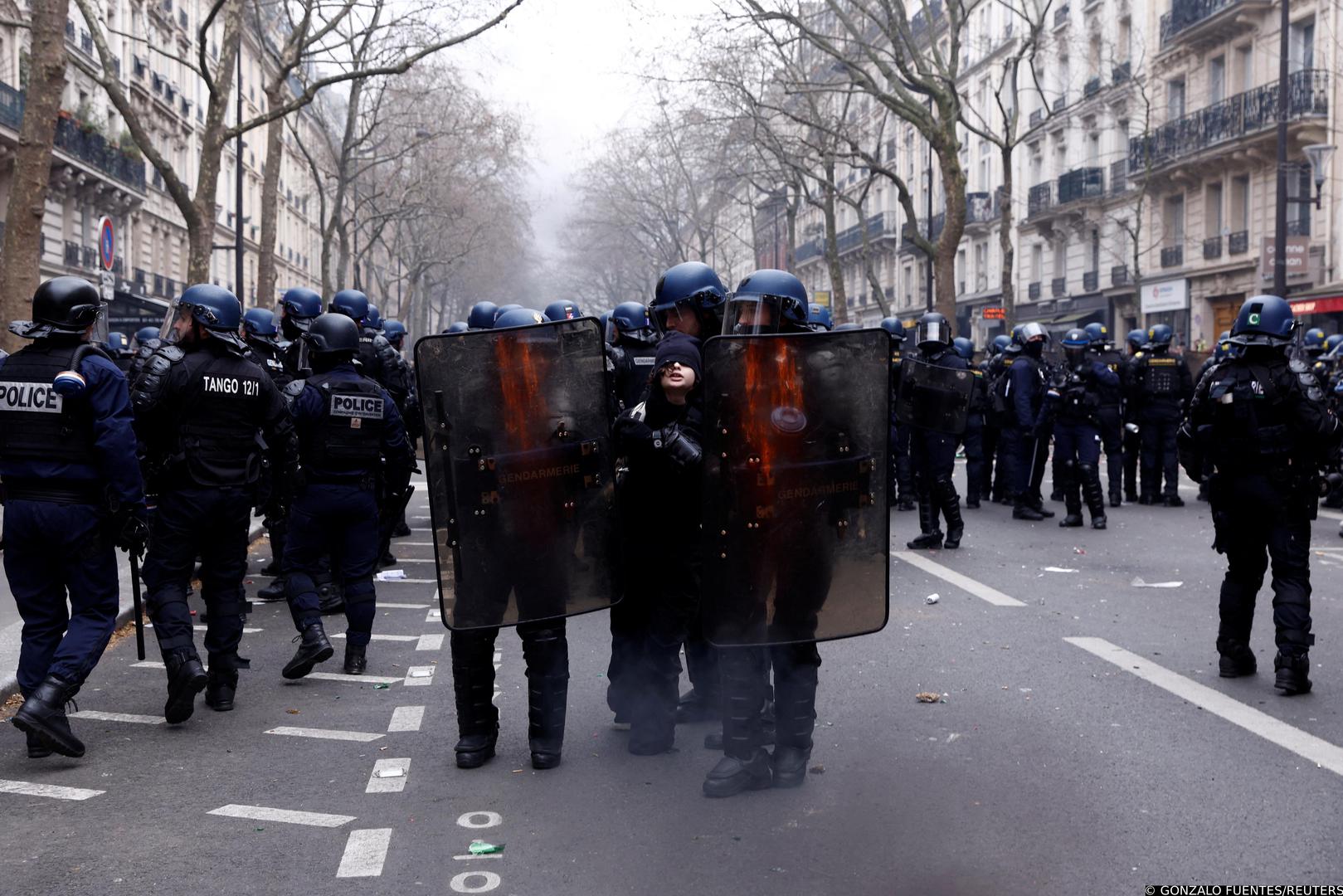 French gendarmes apprehend a protester during clashes at a demonstration as part of the tenth day of nationwide strikes and protests against French government's pension reform, in Paris, France, March 28, 2023. REUTERS/Gonzalo Fuentes Photo: GONZALO FUENTES/REUTERS