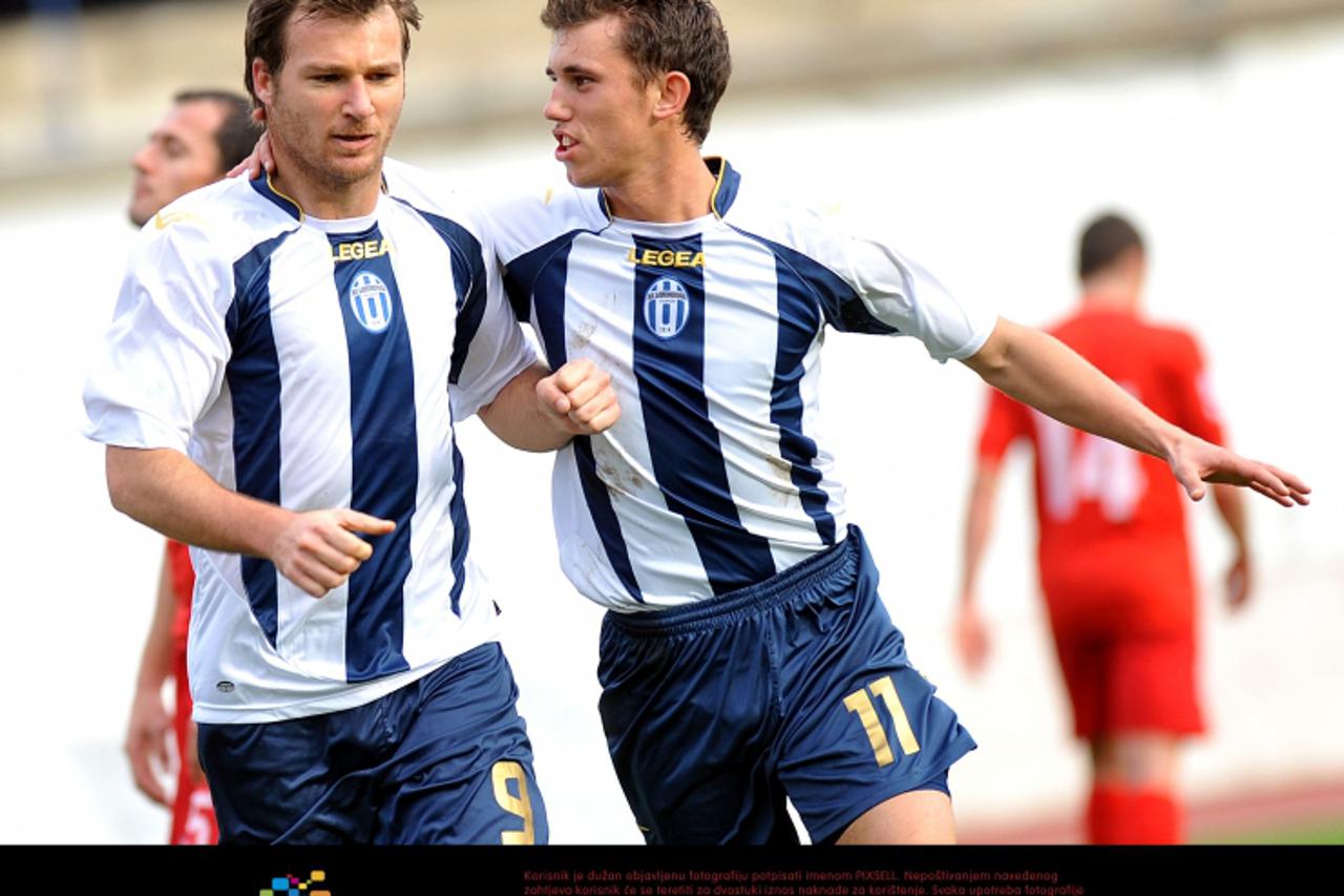 \'20.11.2010., stadion Maksimir, Zagreb - Nogometna utakmica 16. kola prve HNL, NK Lokomotiva - NK Zagreb. Nino Bule slavi pogodak iz jedanaesterca za 1-0. Josip Pivaric mu cestita.  Photo: Goran Stan