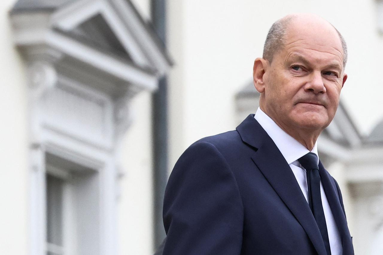 German Chancellor Olaf Scholz leaves the Bellevue Palace in Berlin