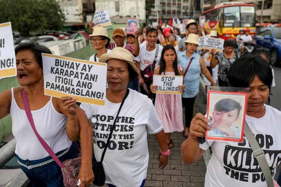 FILE PHOTO: Filipino activists, and relatives of people killed in the country's war on drugs, hold a rally in observance of Human Rights Day in Manila,