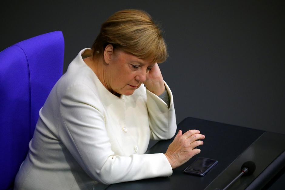 German Chancellor Angela Merkel attends a session of the Bundestag, in Berlin