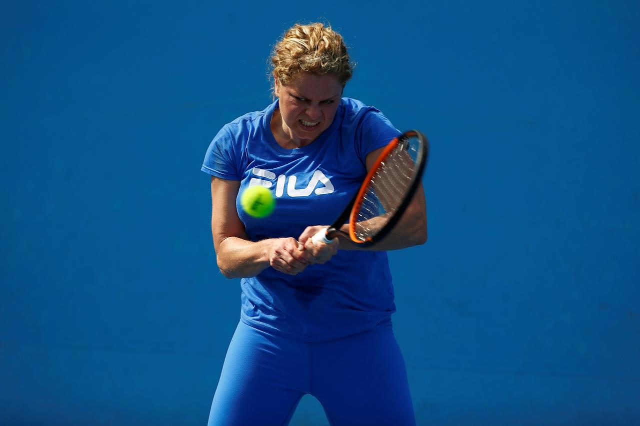 FILE PHOTO: Belgium's Kim Clijsters hits a shot during a practice session at Melbourne Park, Australia