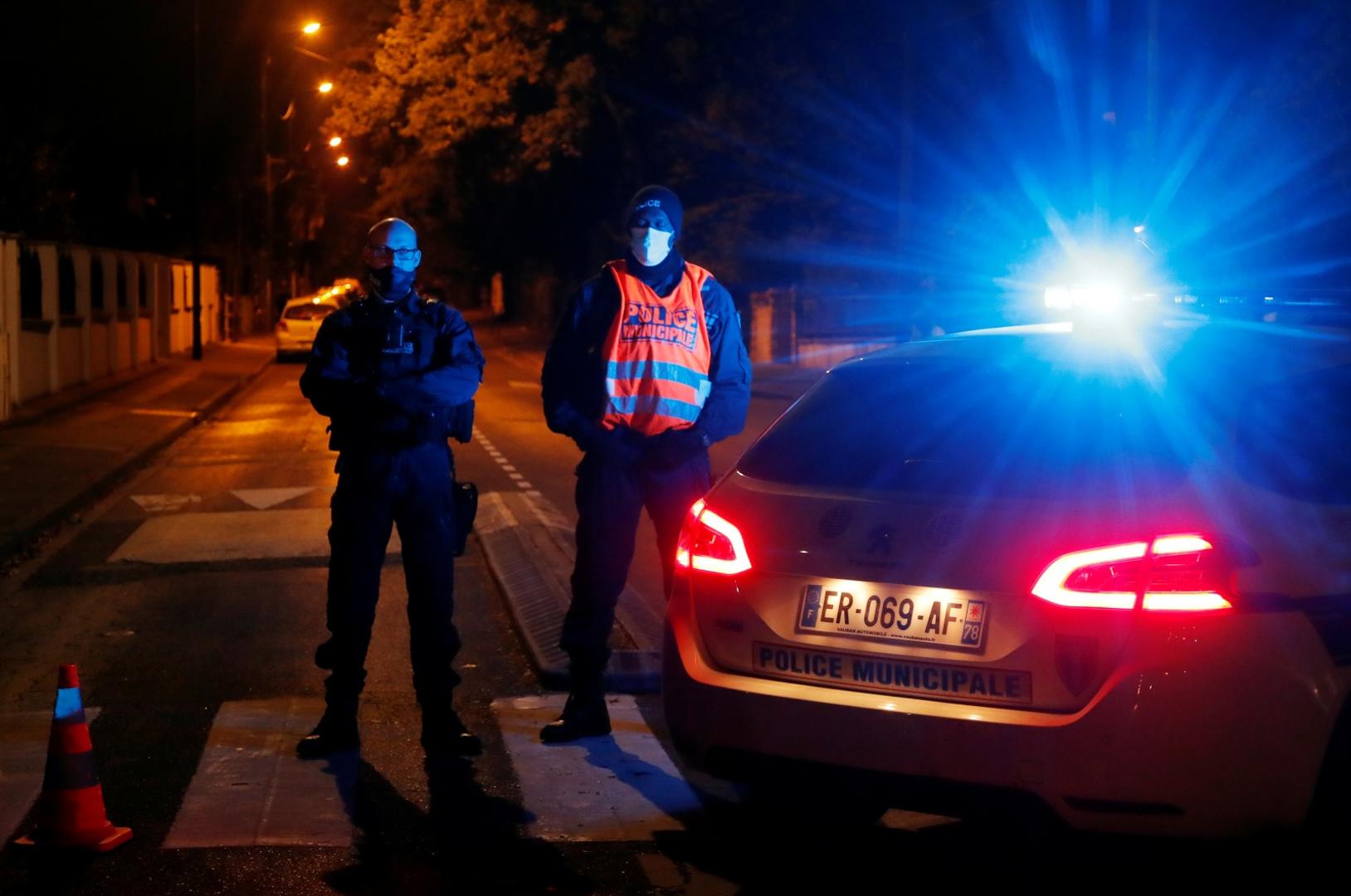 Stabbing attack in the Paris suburb of Conflans St Honorine Police officers secure the area near the scene of a stabbing attack in the Paris suburb of Conflans St Honorine, France, October 16, 2020. REUTERS/Charles Platiau CHARLES PLATIAU