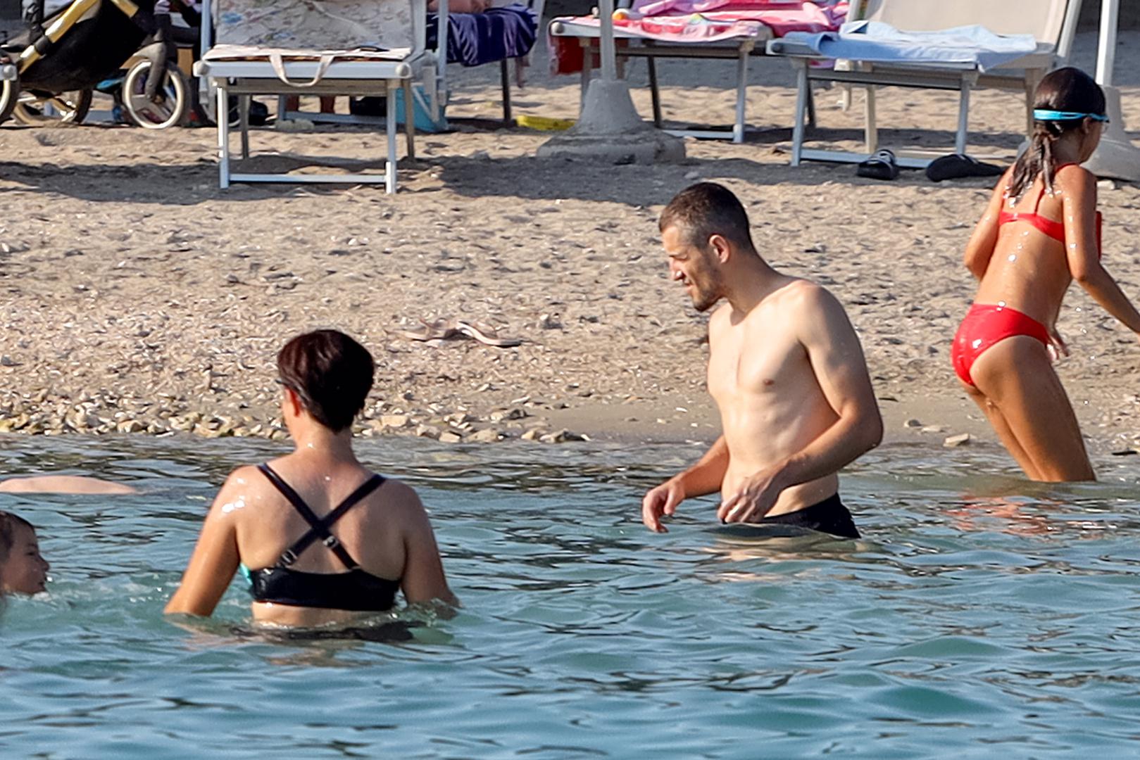 18.07.2024., Petrčane - Arijan Ademi odmara na plazi u Punta Skali Photo: Sime Zelic/PIXSELL