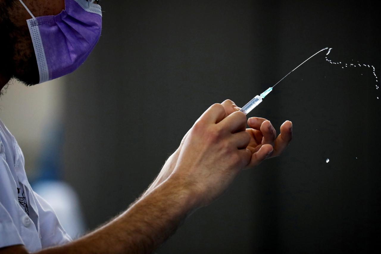 FILE PHOTO: Vaccine vs. variant: Israel's data race to defeat the pandemic