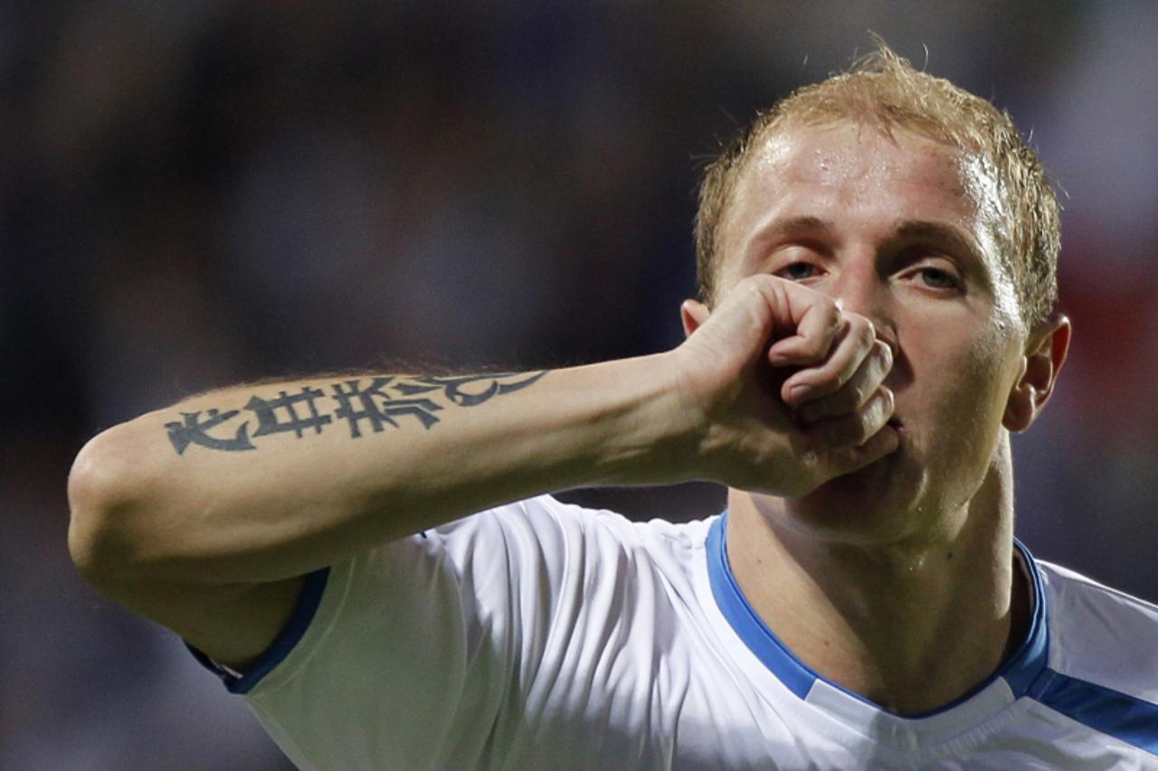 \'Bosnia\'s Senijad Ibricic celebrates his goal against Luxembourg during their Euro 2012 qualifying soccer match in Luxembourg September 3, 2010.     REUTERS/Thierry Roge   (LUXEMBOURG - Tags: SPORT 