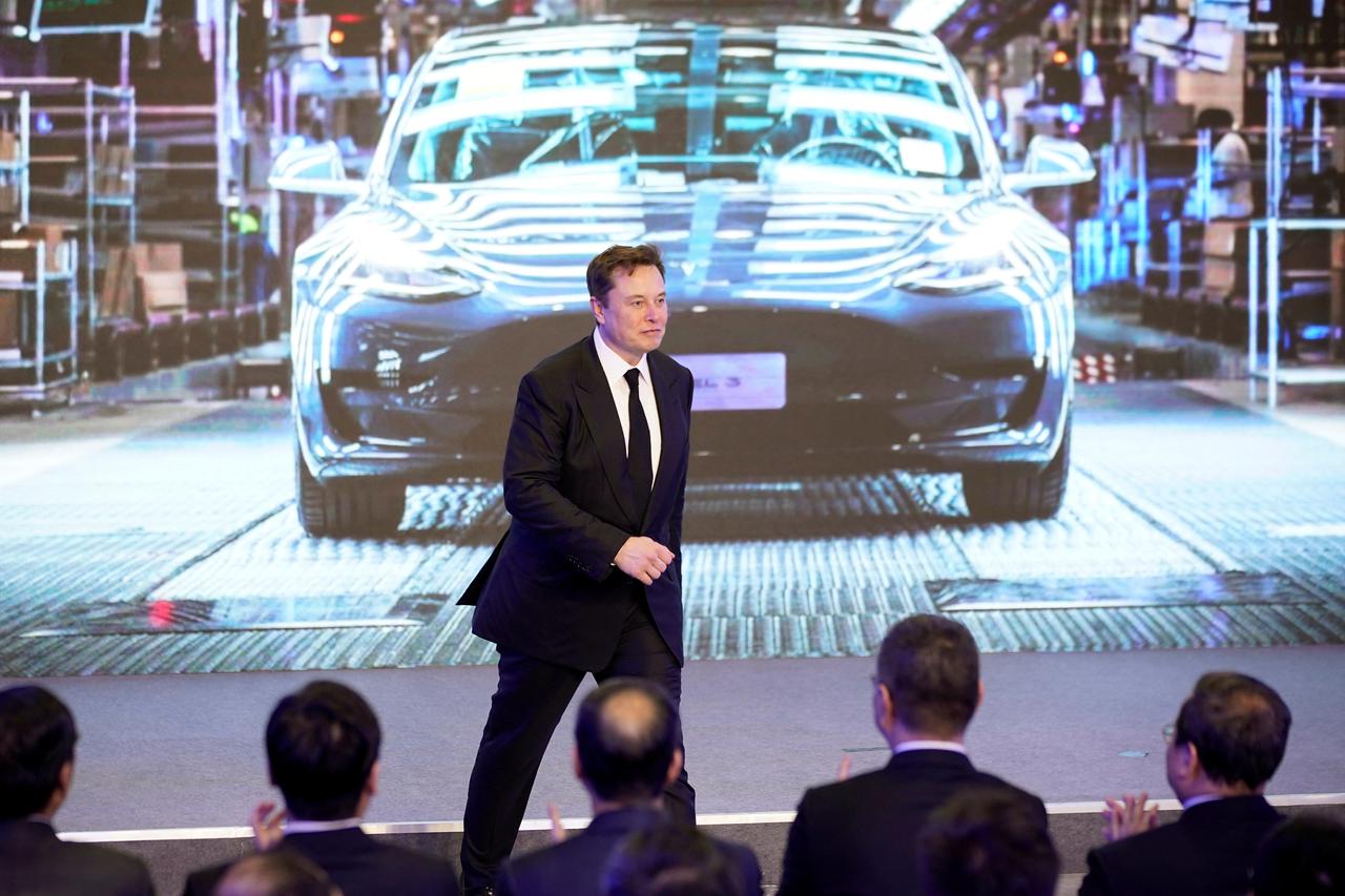 FILE PHOTO: Tesla Inc CEO Elon Musk attends an opening ceremony for Tesla China-made Model Y program in Shanghai